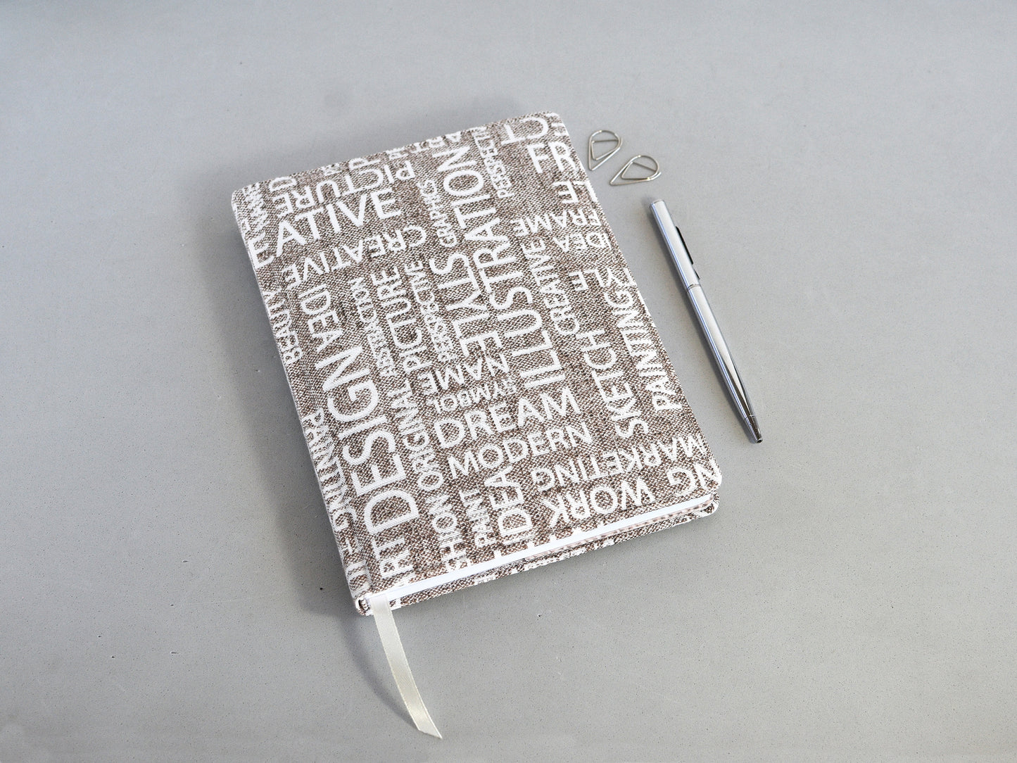Blank pages fabric notebook whith a hard cover