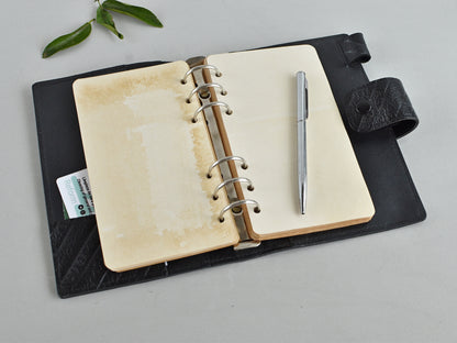 ring notebook with vintage-styled paper