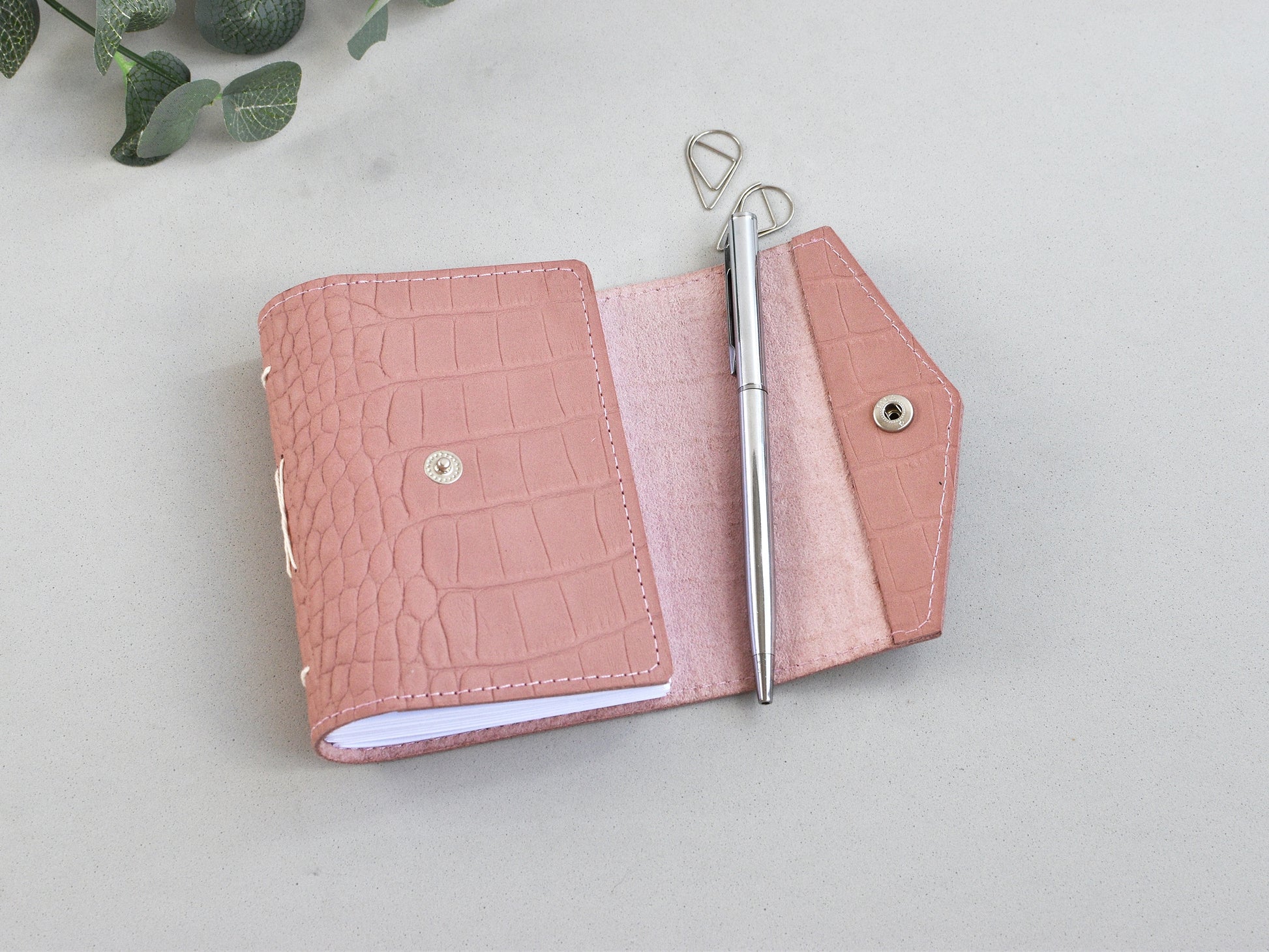 Opened pink leather journal