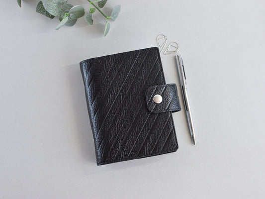 Black leather ring binder