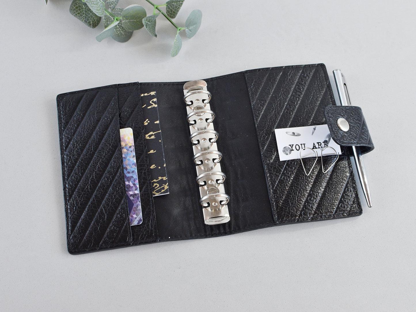 Black leather notebook pocket size