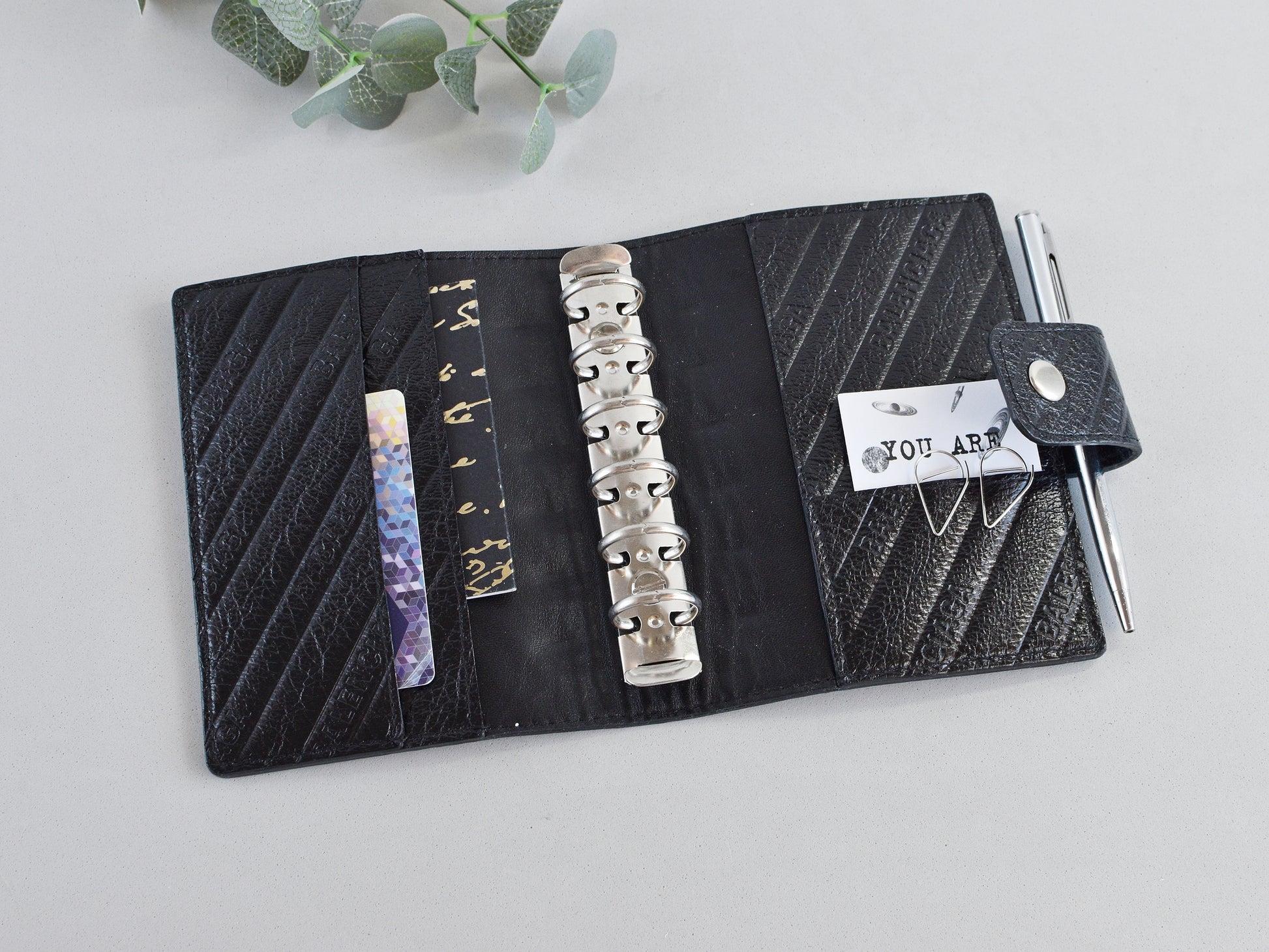 Black leather notebook pocket size