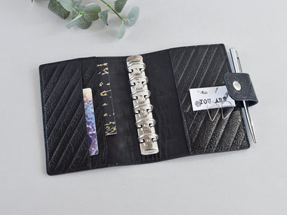 Black leather notebook pocket size