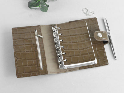 Leather fly-leaf for ring pocket planner