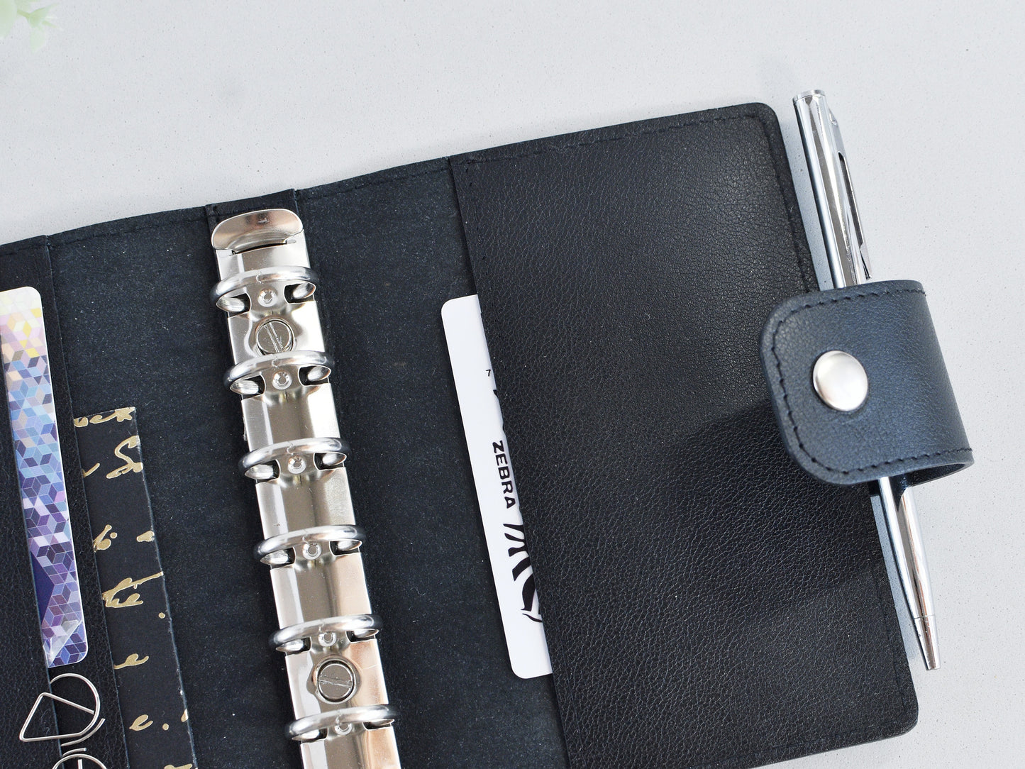 Back pocket on the black leather binder