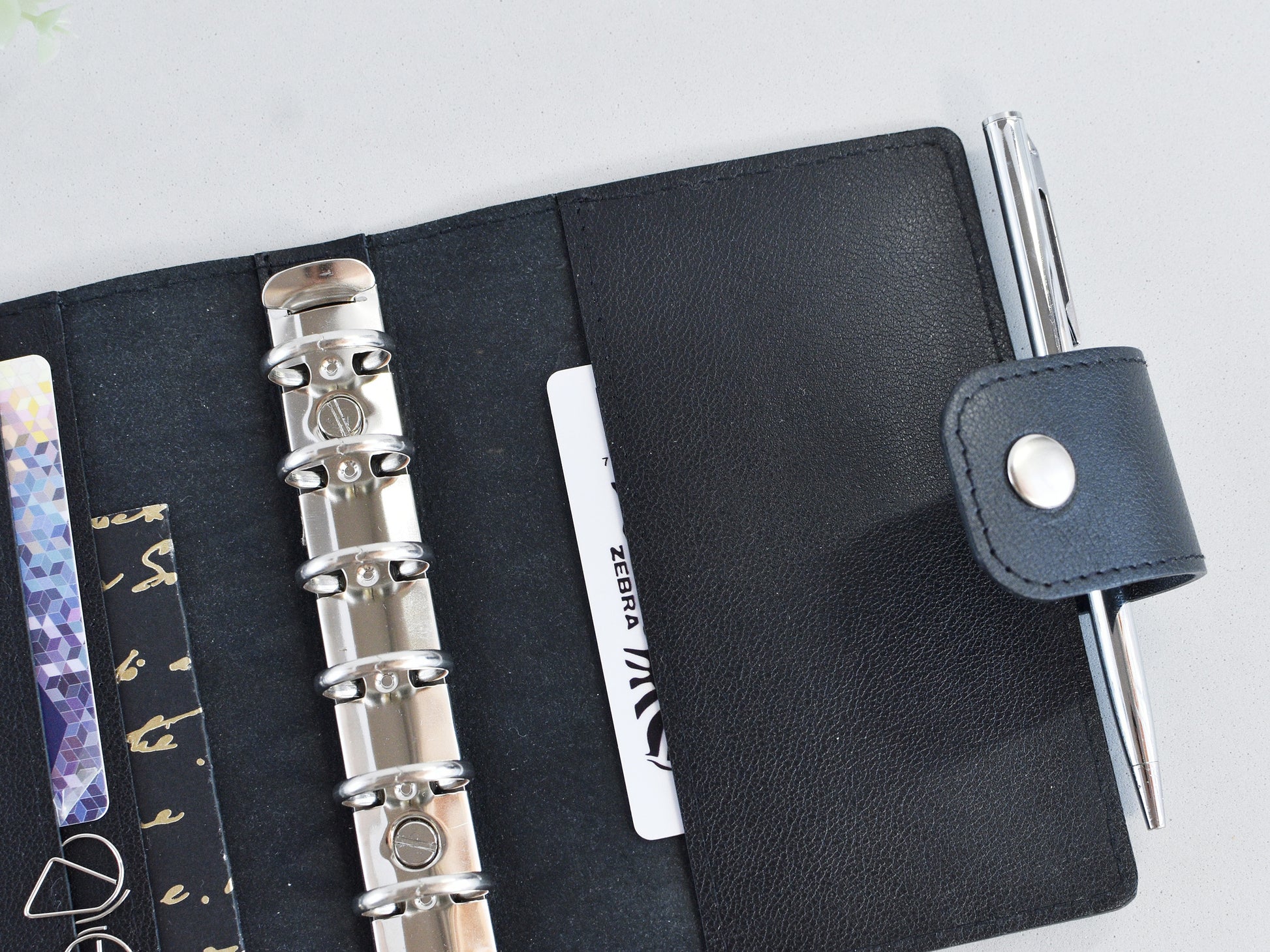 Back pocket on the black leather binder