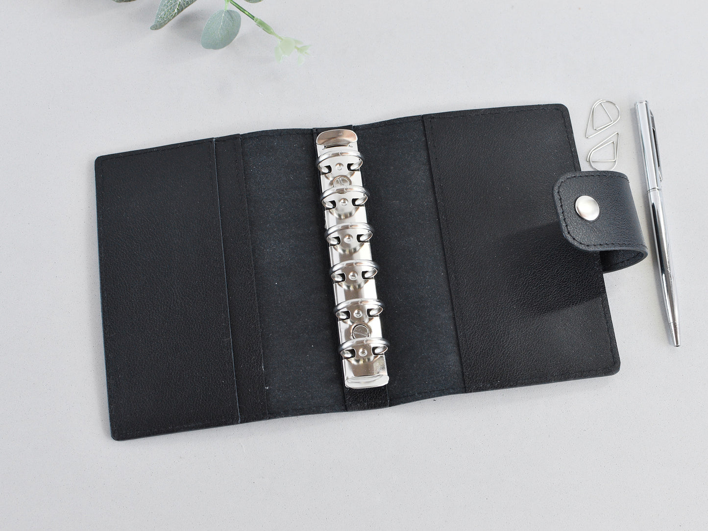 Black leather 6-ring binder, Pocket size A7. Refillable planner notebook