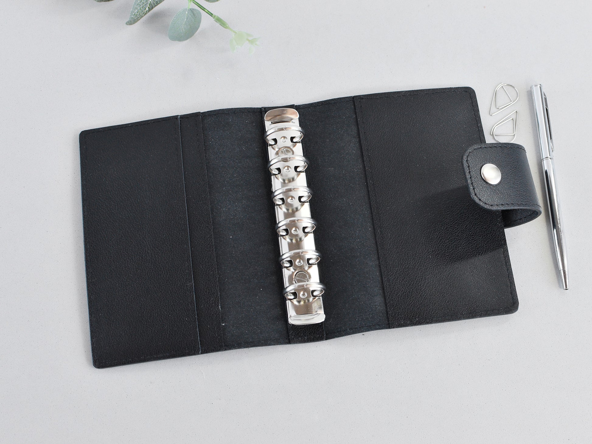 Black leather 6-ring binder, Pocket size A7. Refillable planner notebook