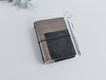 Passport size TN planner with front pocket, brown color