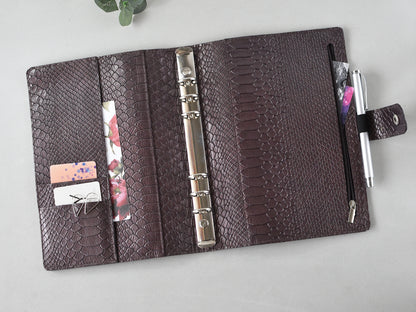 6-ring python leather notebook, show on the desk