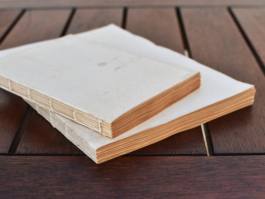 Old style pre-sewed paper blocks for crafting