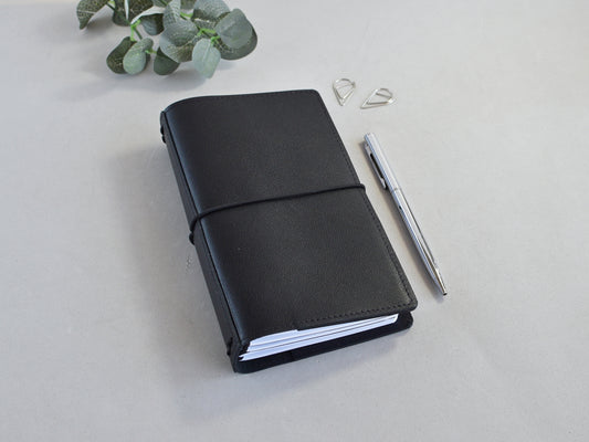 Leather TN with a silver pen