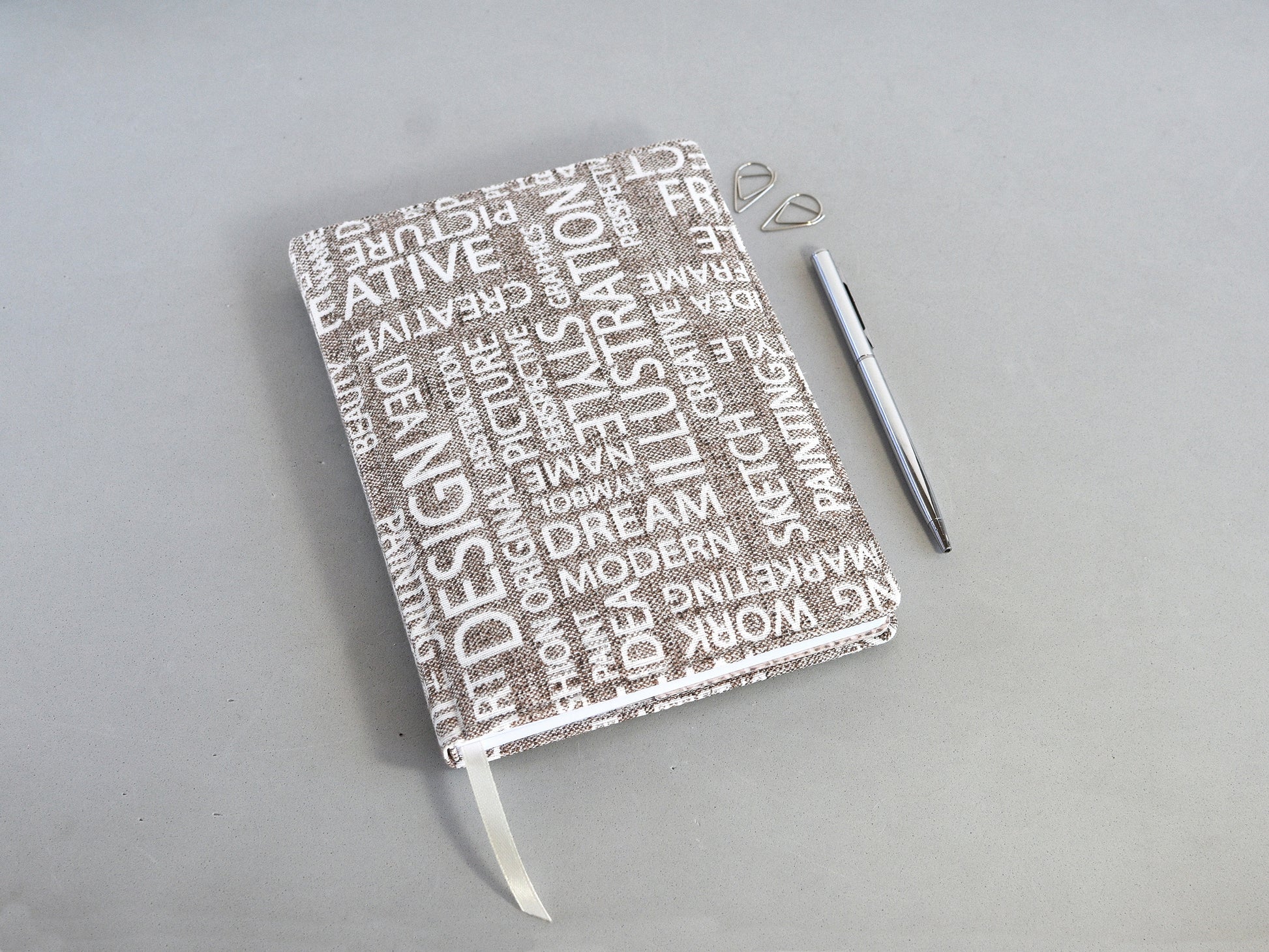 Blank pages fabric notebook whith a hard cover