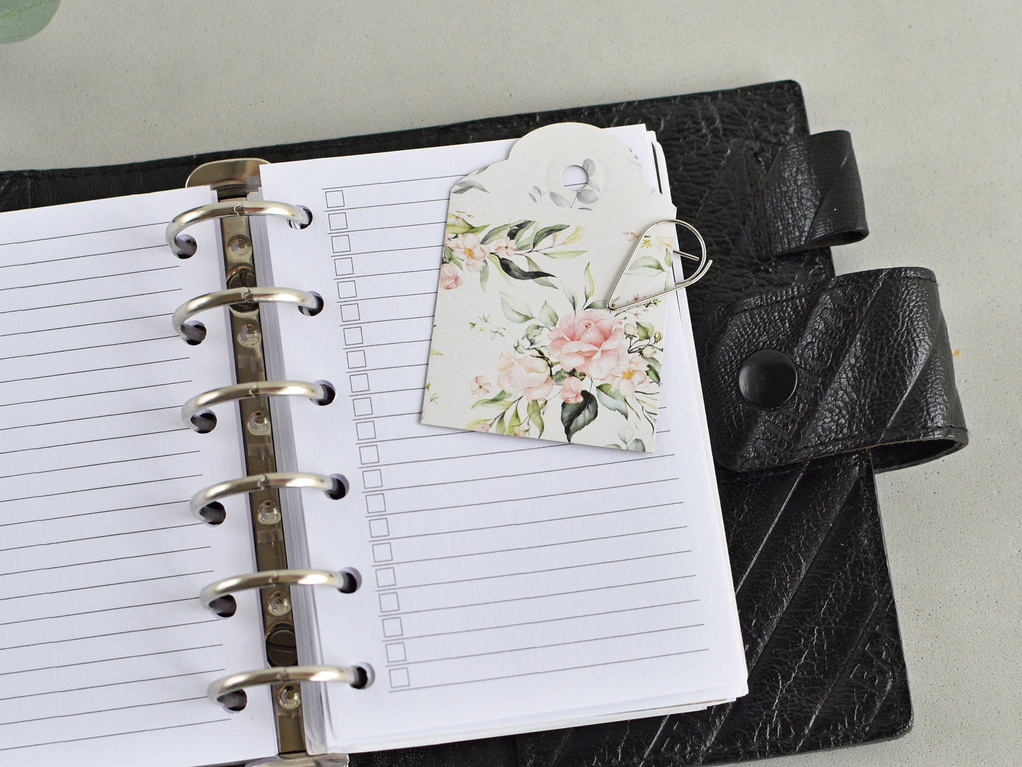 Notebook with a decorative clips