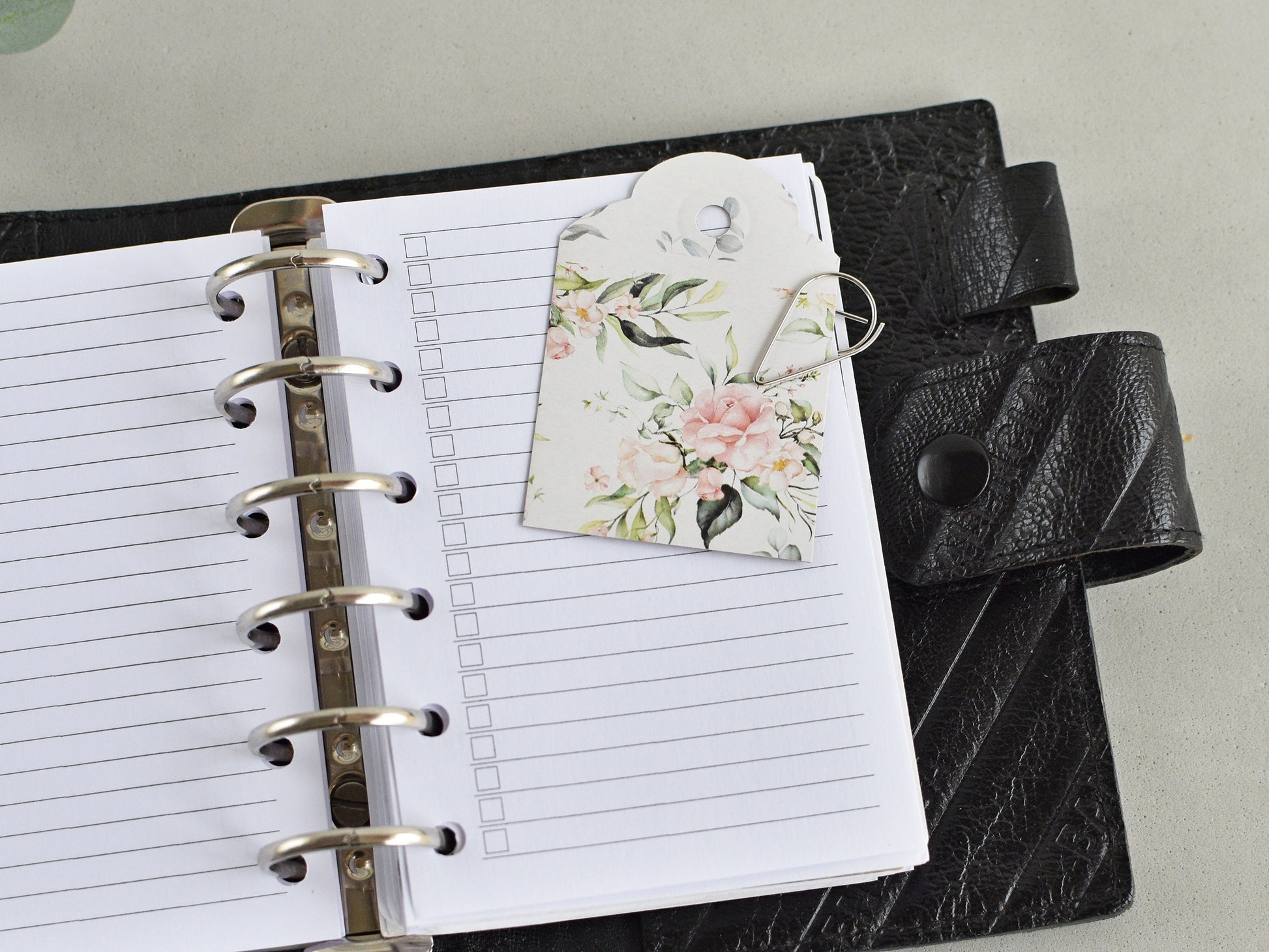 Notebook with a decorative clips