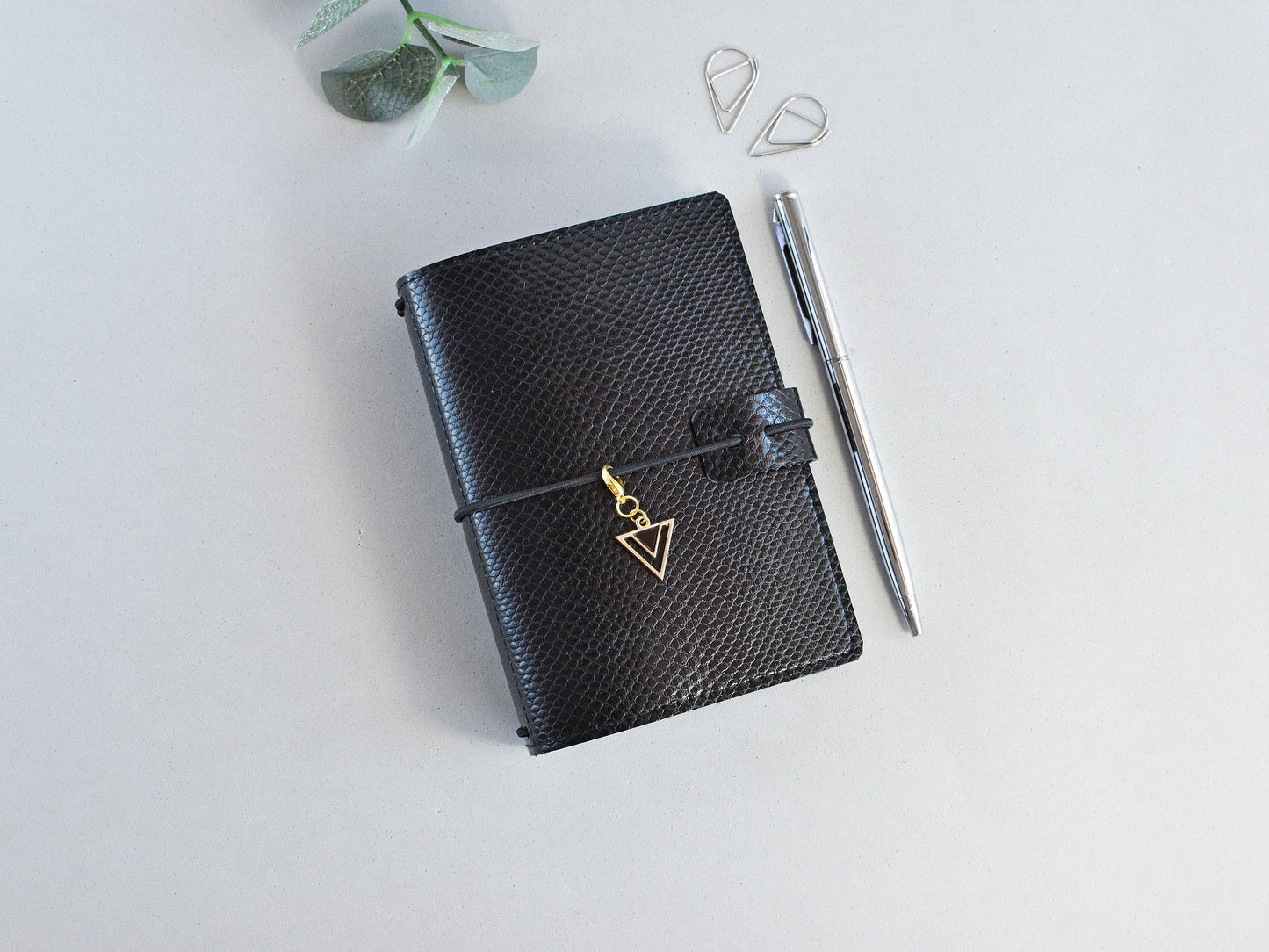 Black faux leather travel journal