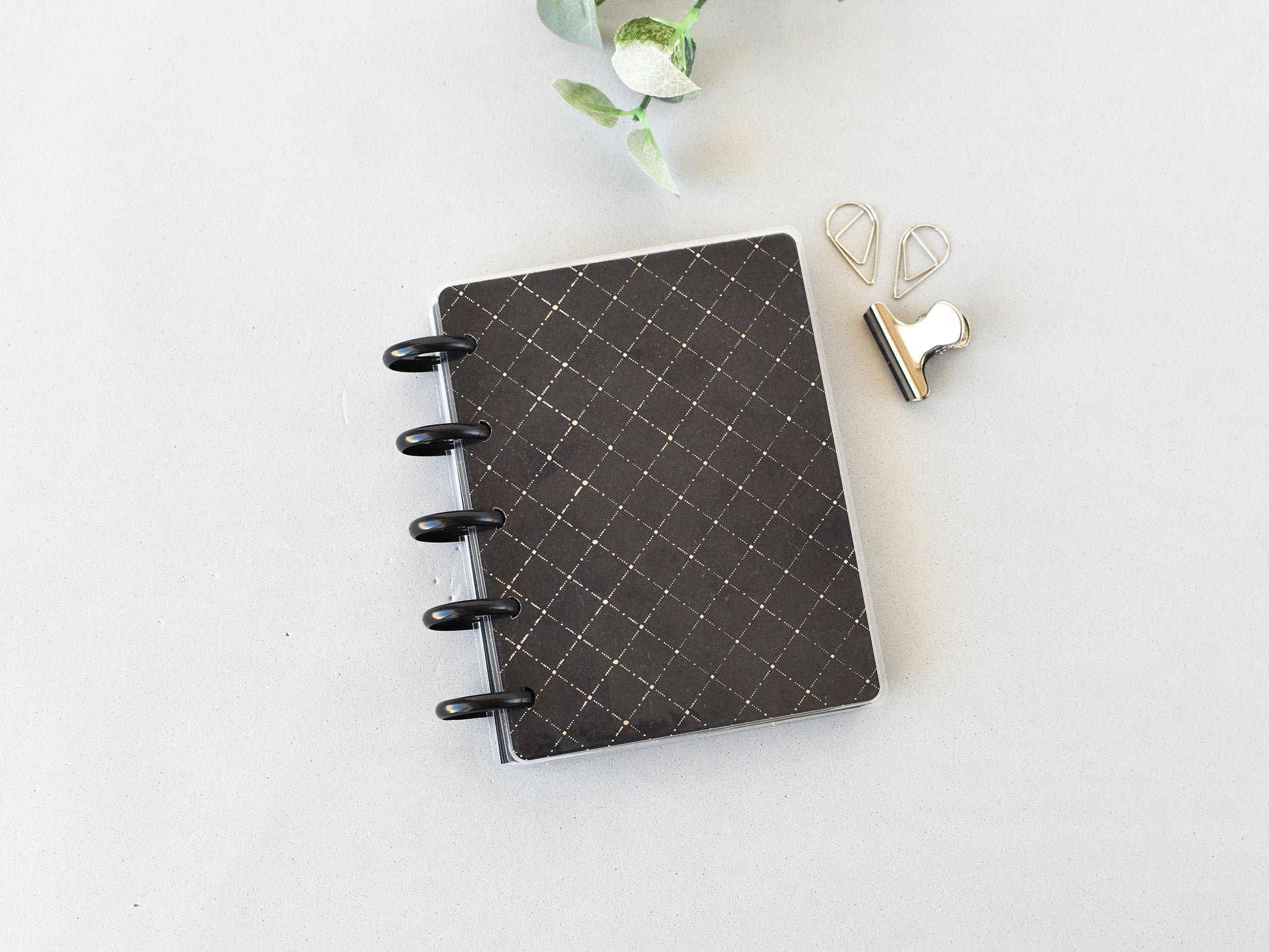 Black dis notebook with silver clips