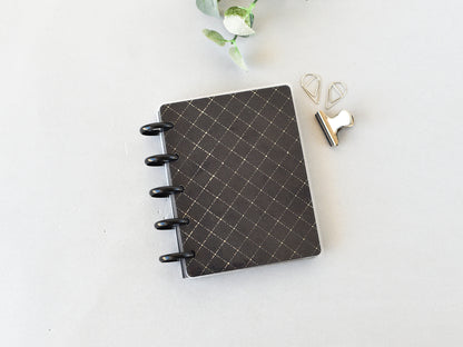 Black dis notebook with silver clips