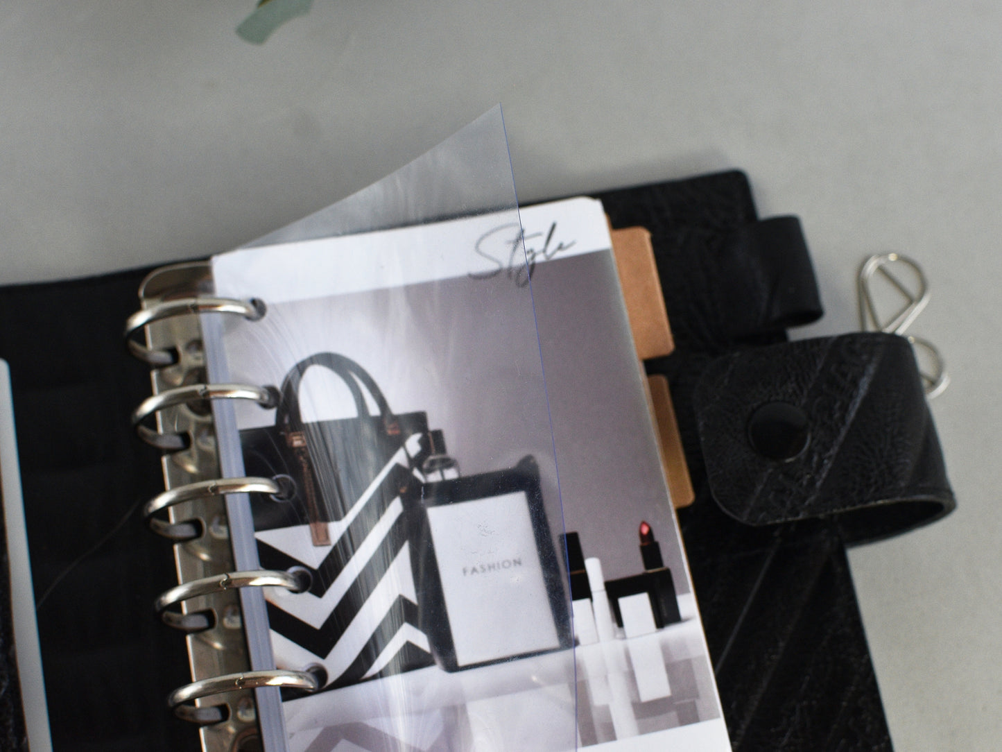 Planner with black and white design on a gray surface