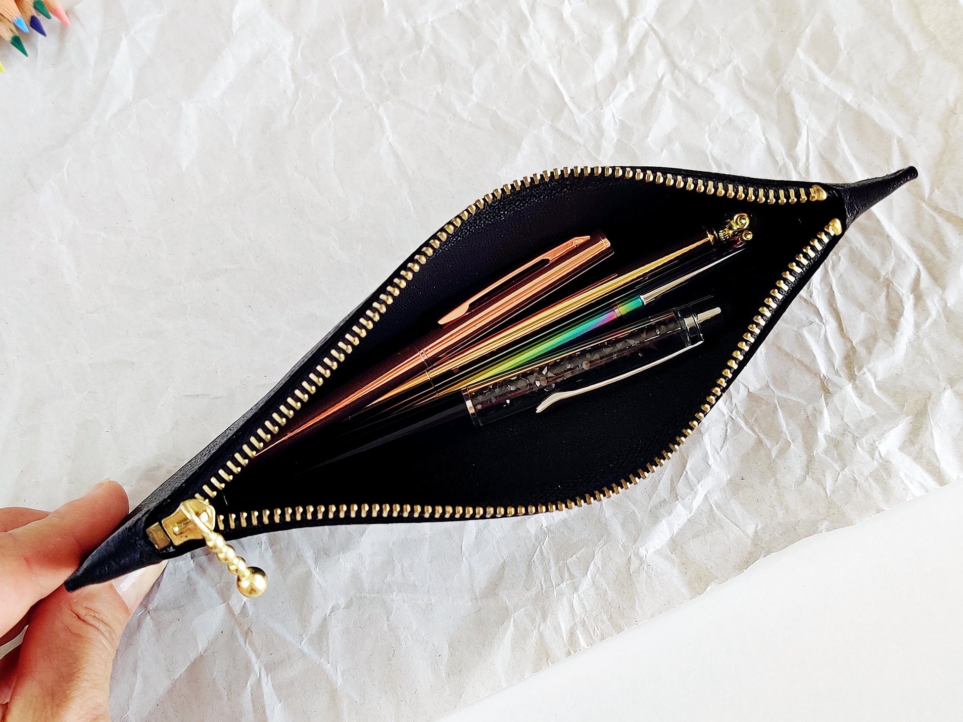 Open zippered pen case