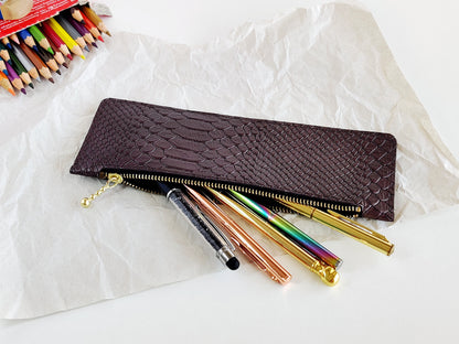 Opened leather pen case with zipper