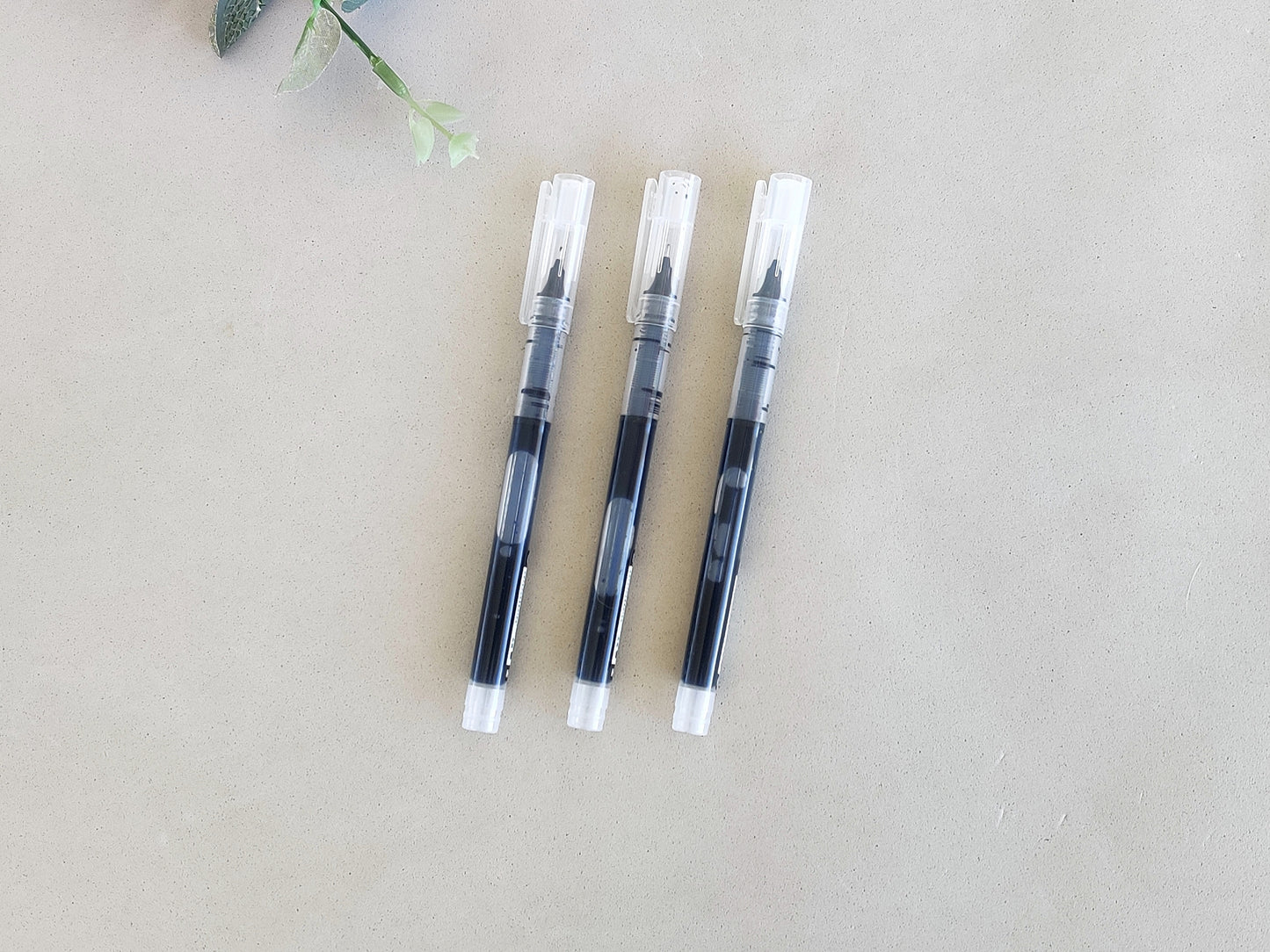 Rollerball Pen With a Liquid Ink Reservoir