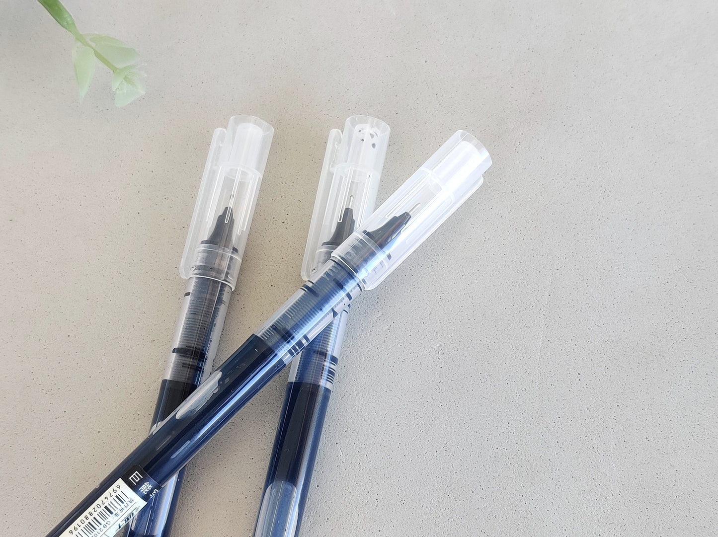 Rollerball Pen With a Liquid Ink Reservoir