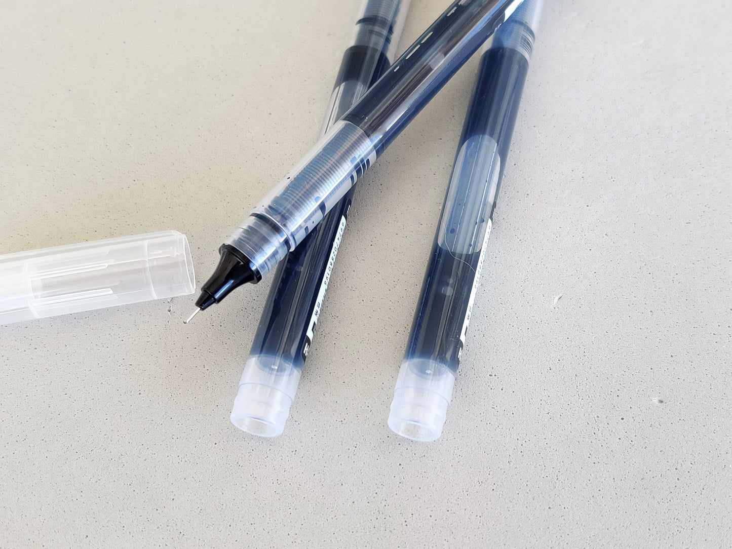 Rollerball Pen With a Liquid Ink Reservoir